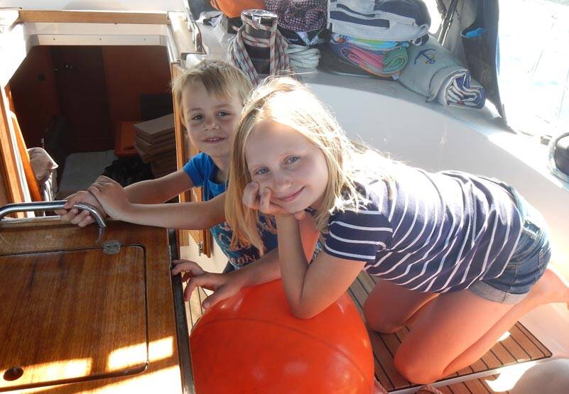 Kids on a sailing boat